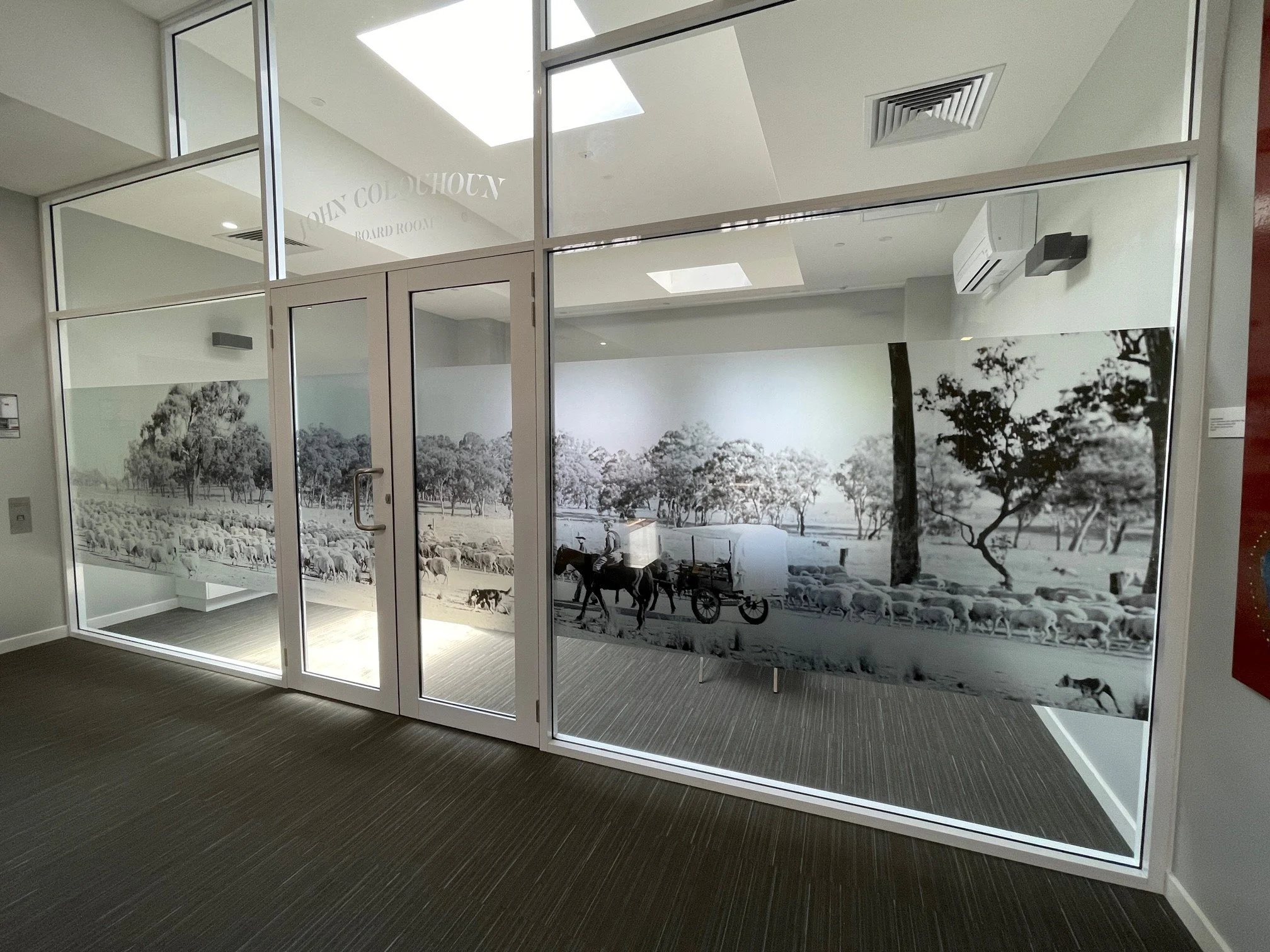 Printed film feature across office glazing