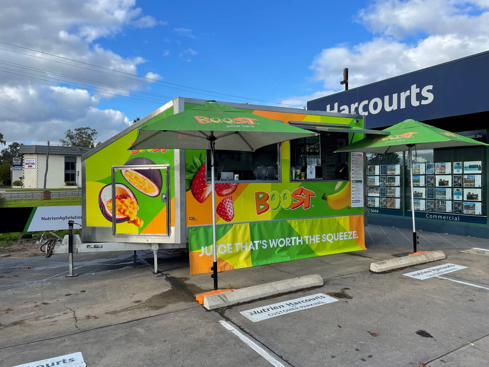 Printed PVC banner and wrap on a juice bar event trailer