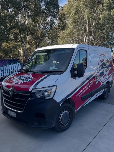Partial wrap with sweeping brand graphics on a catering supplier van